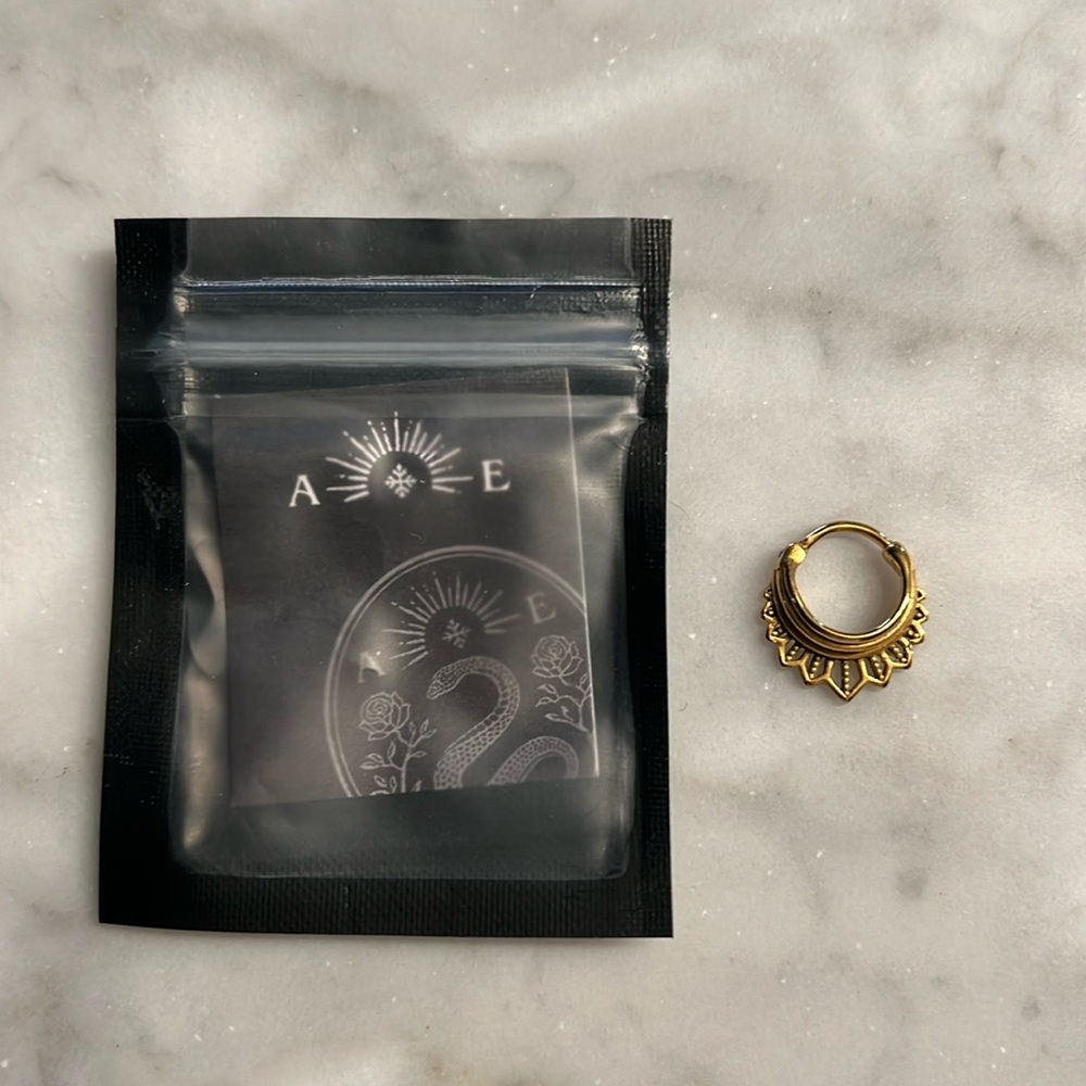 Ask & Embla septum clicker. Gold.